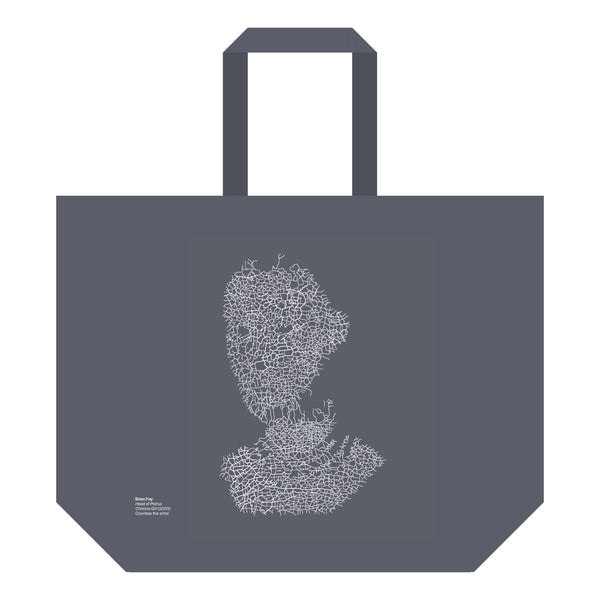 Front of large grey tote bag by Brian Fay on a white background showing an outline of a face in the centre of the bag.