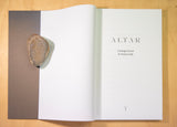 An open book. The inside page reads 'Altar, Clodagh Emoe and Donal Lally'.