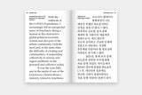 Open publication 'Loneliness: Rebecca Moccia's Ministry of Loneliness and Timely Conversations'.Text in black on both left and righthand side of the page, in English on the left and Korean on the right. The image of the publication is taken on a white background.